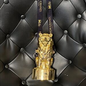 MGM Grand Las Vegas gold Lion drink souvenir cup with strap 9 inch plastic